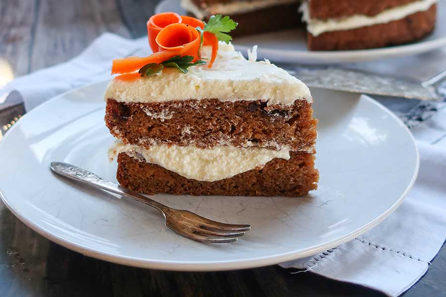a slice of vegan carrot cake for mother’s day brunch