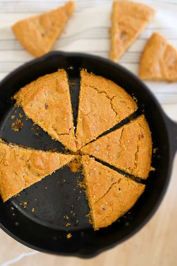 gluten free vegan cornbread slices in a skillet