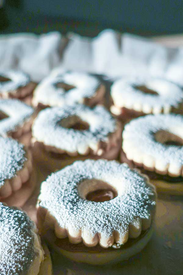 close up of cookies dusted with powder sugar
