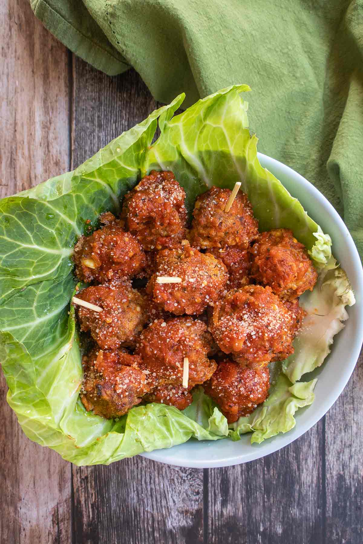 overview of gluten free baked meatballs in a cabbage leaf