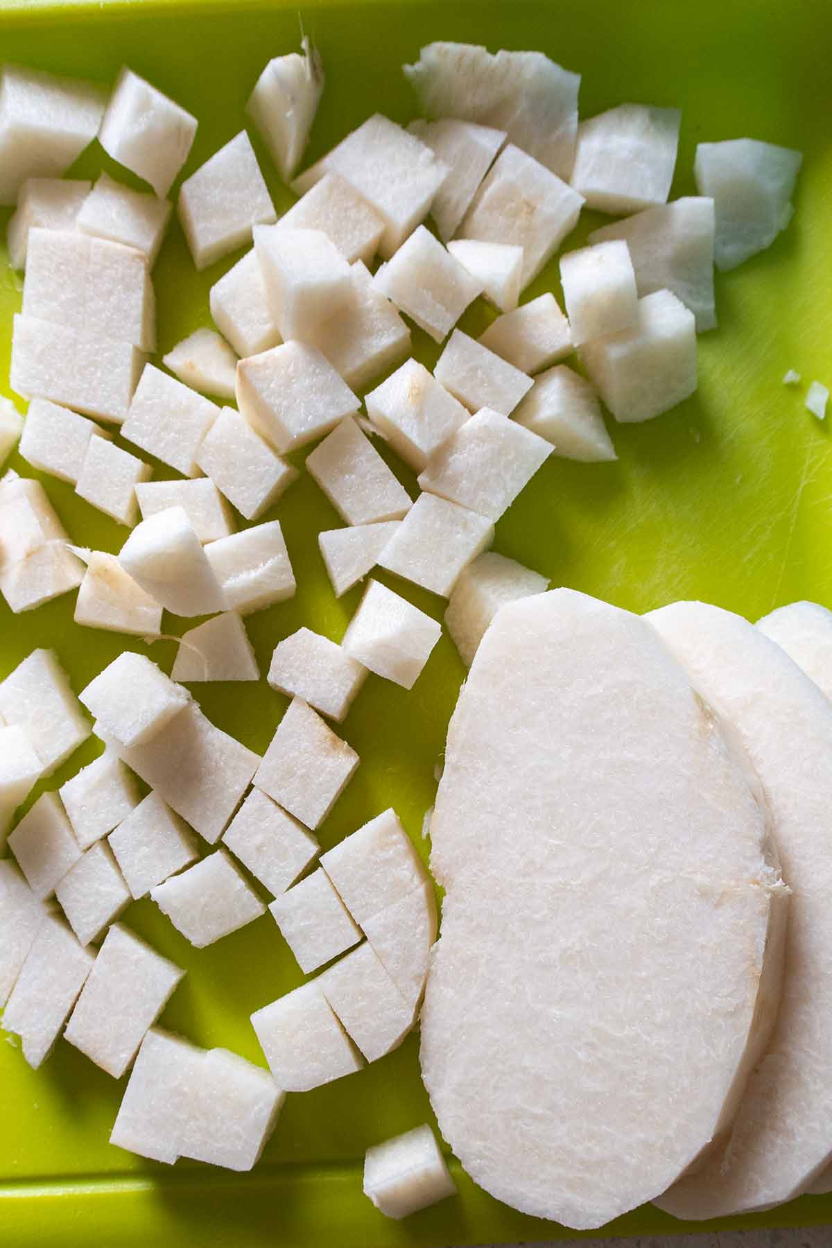 cubed jicama on a cutting board