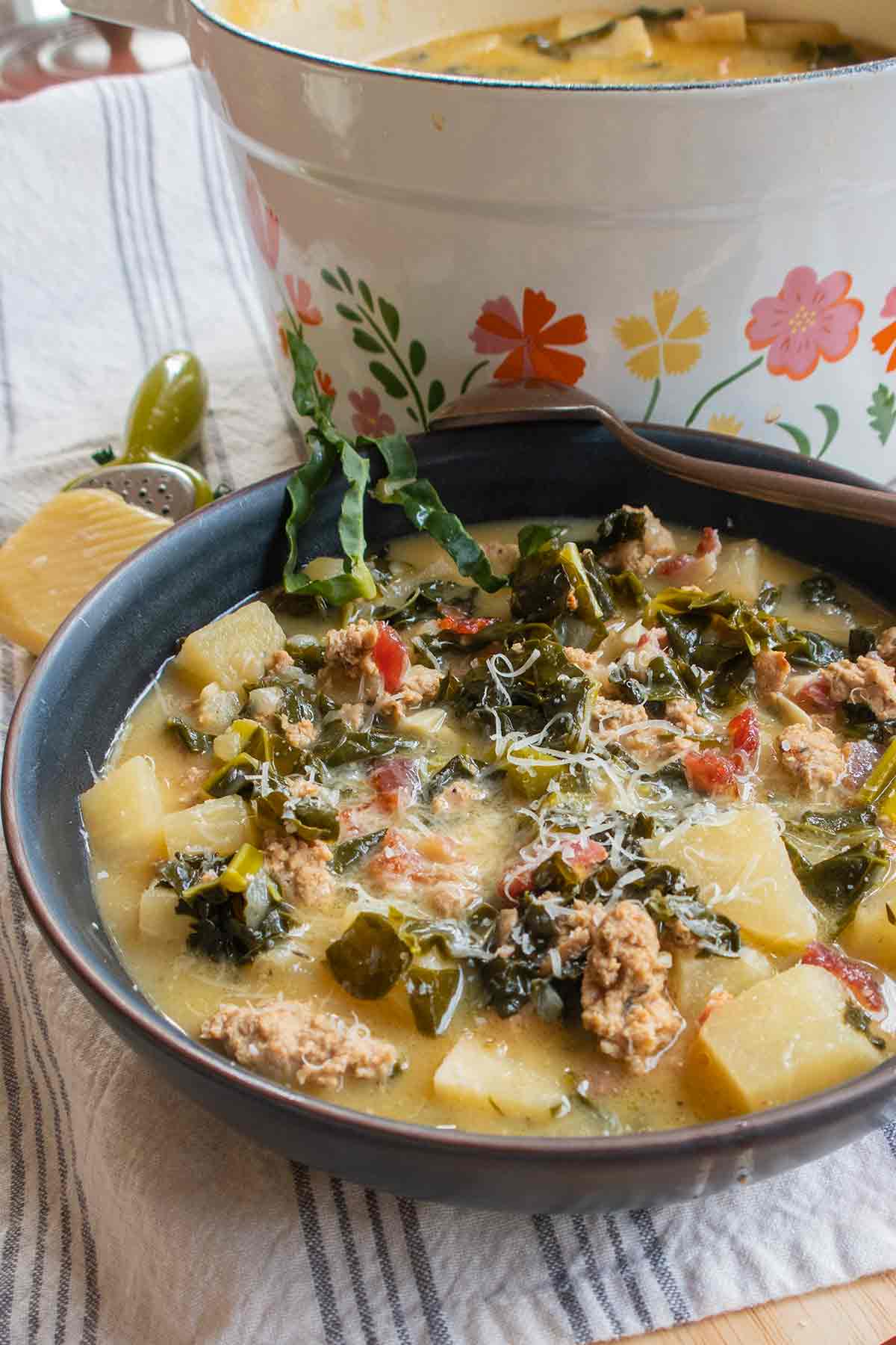 close up of creamy low-carb Italian soup with sausage and veggies in a bowl 