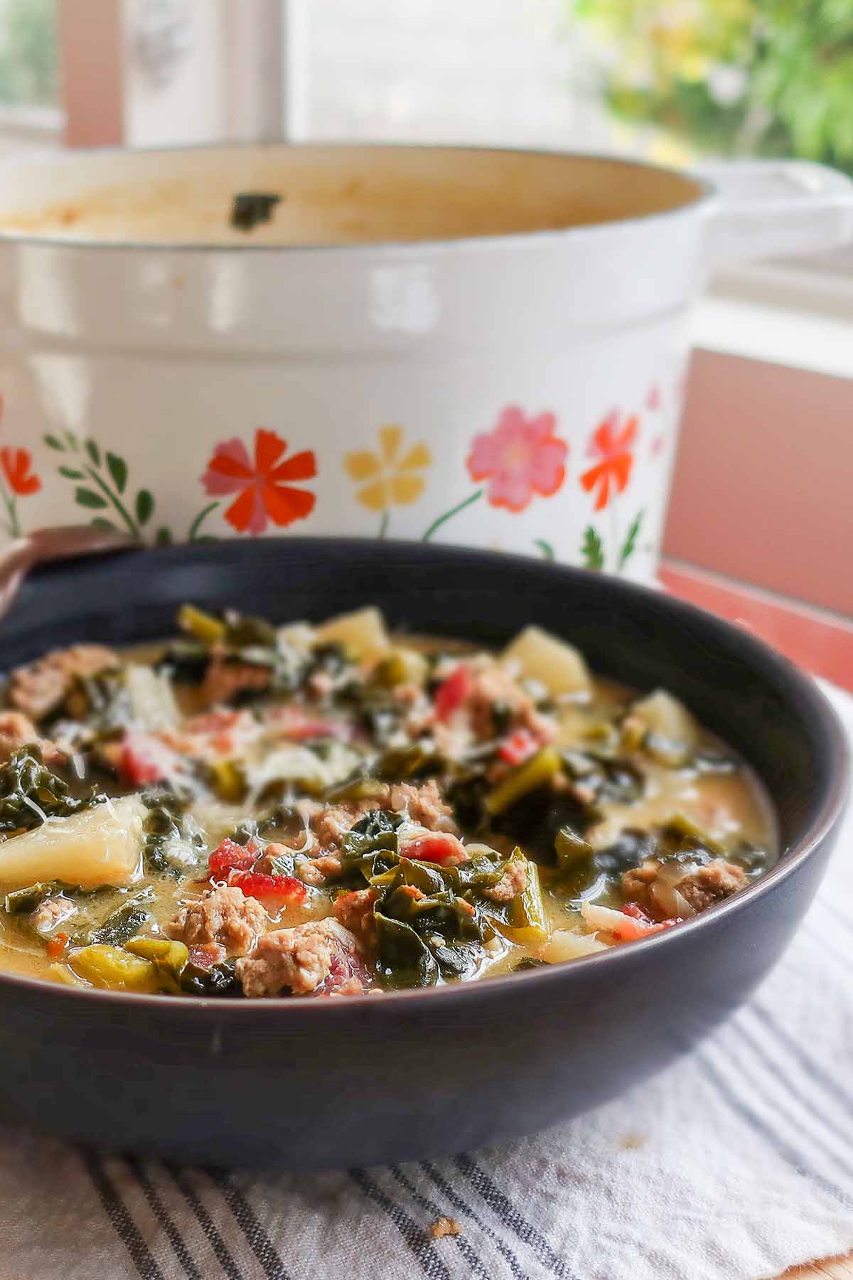 a bowl of low carb zuppa toscana