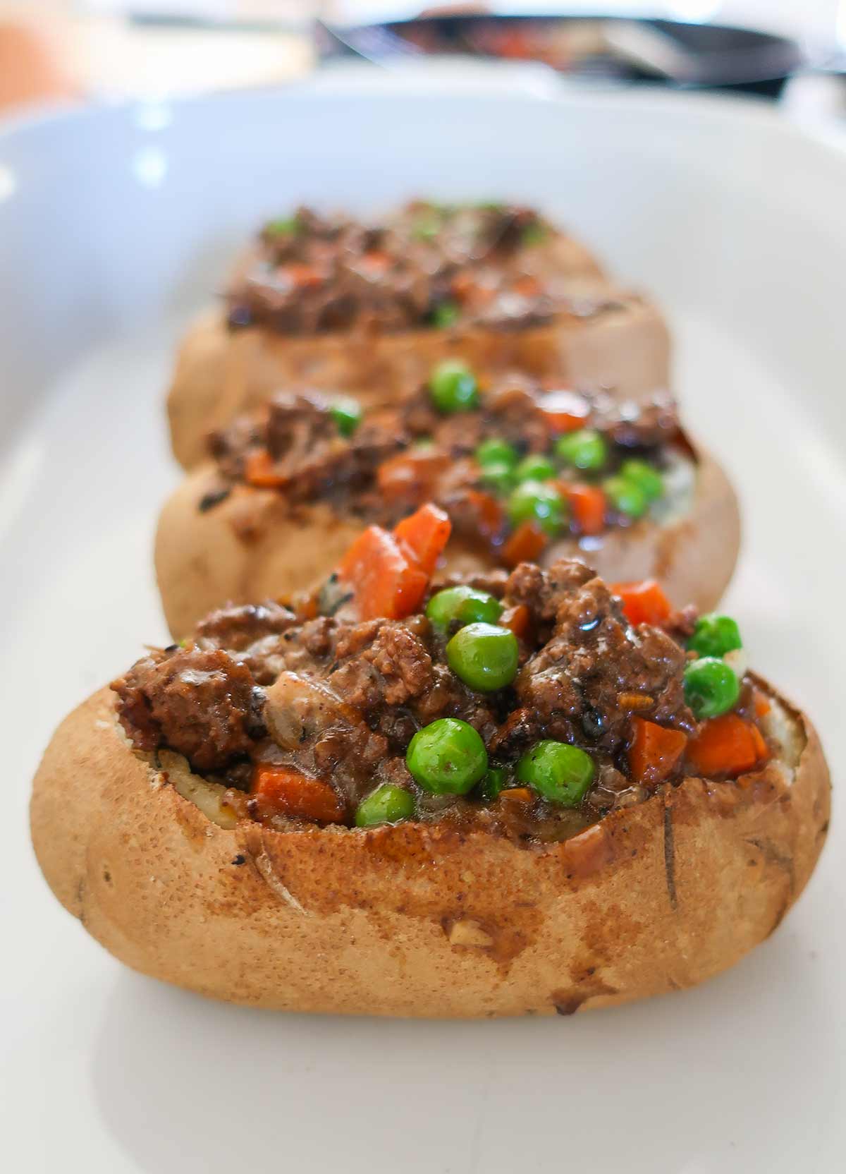 filled potato skins with meat and veggie mixture