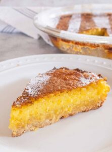 a slice of gluten free lemon chess pie on a dessert plate