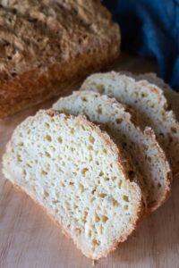 sliced gluten free German potato bread on a cutting board