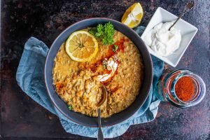 moroccan lentil soup with toppings in a bowl