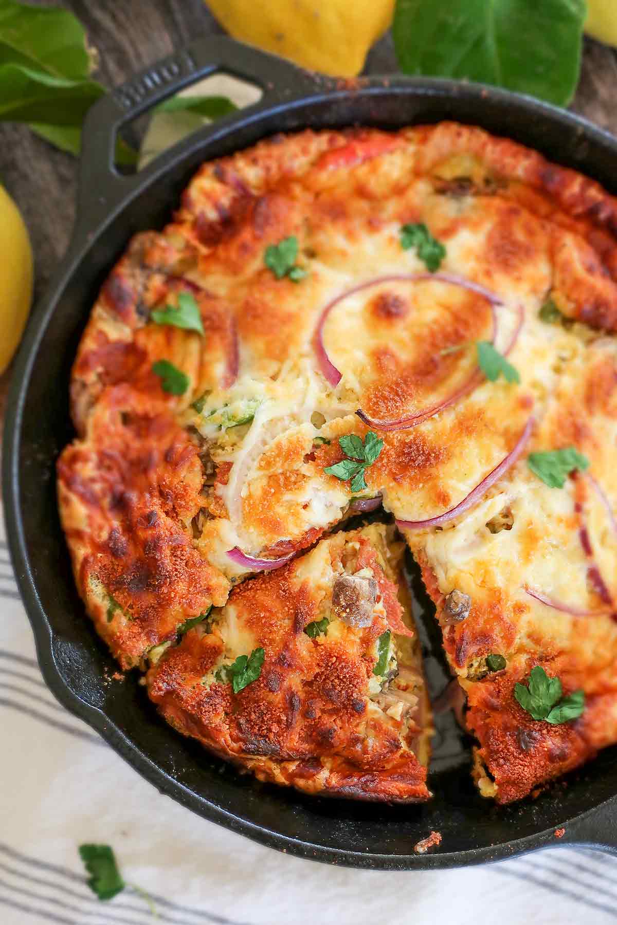 sliced pizza pie in a skillet