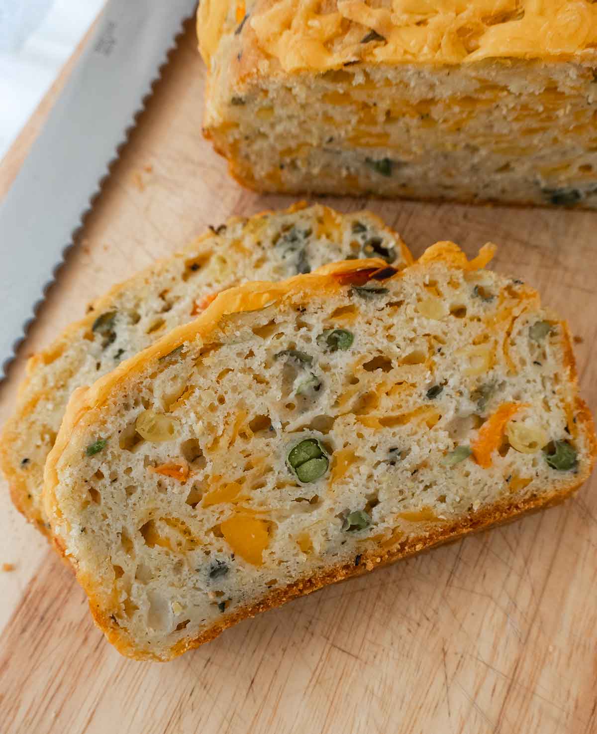 2 slices of savory breakfast bread on a wooden board