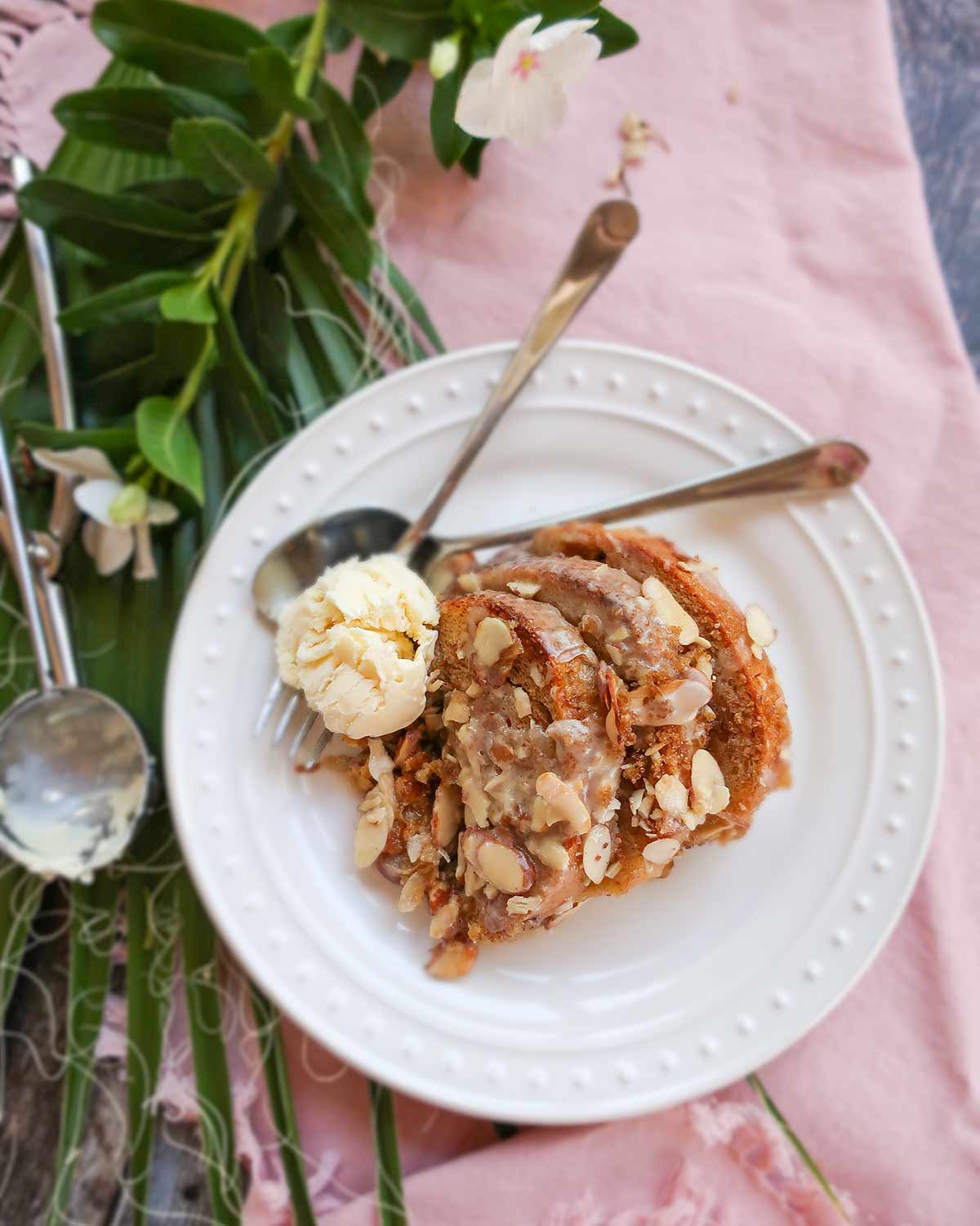 baked French breakfast toast on a plate with a spoon