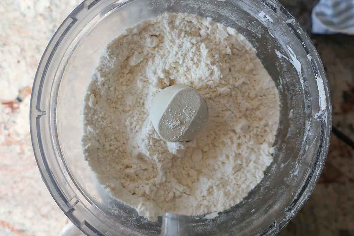 mixing dry ingredients in a food processor
