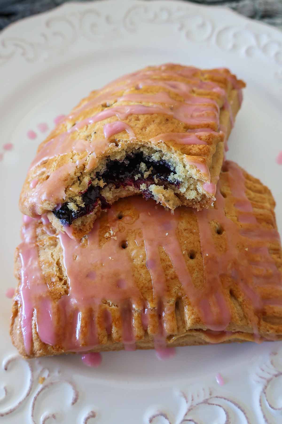 two gluten free pop tarts stacked on a plate