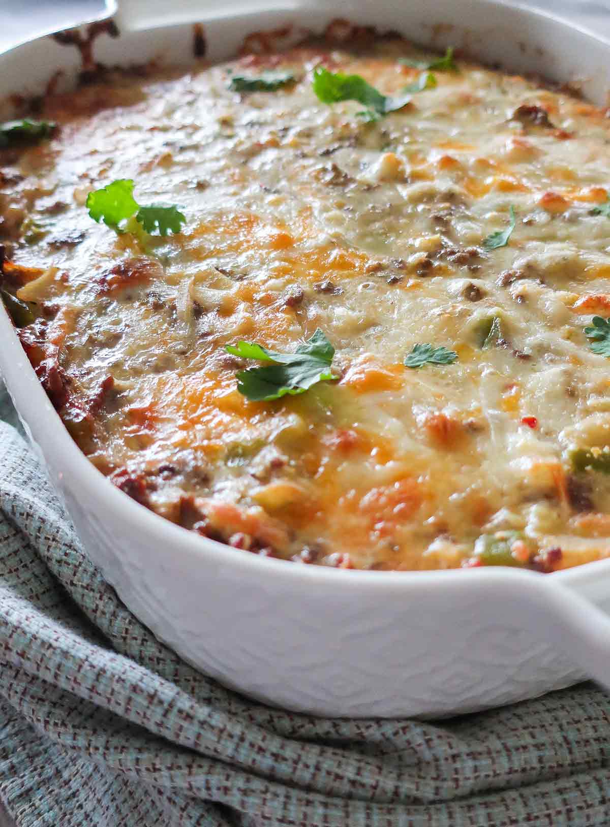 close up of baked sausage breakfast casserole in a dish