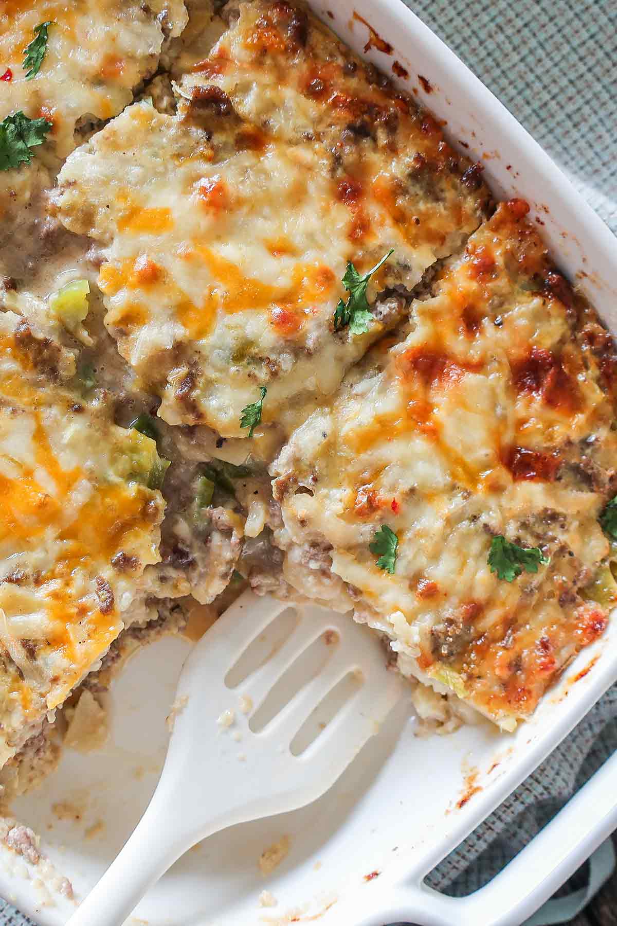 sliced sausage breakfast casserole in a baking dish