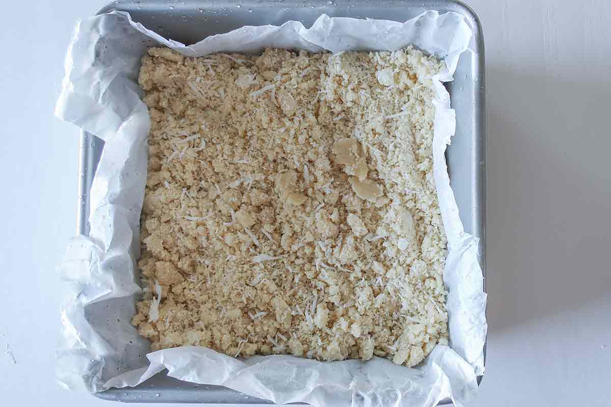 lemon bar crust in a pan before baking