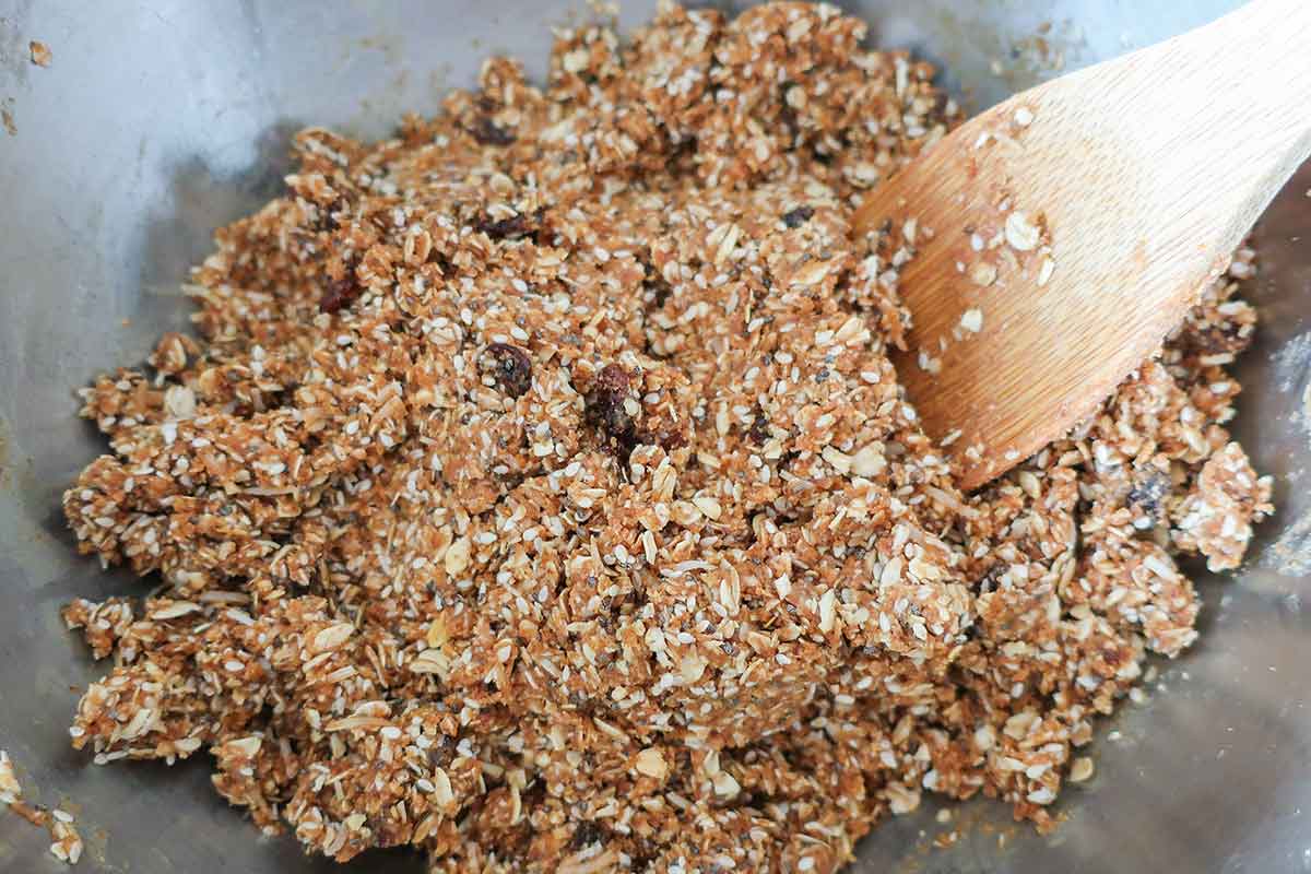 all the ingredients for granola bar blended in a bowl