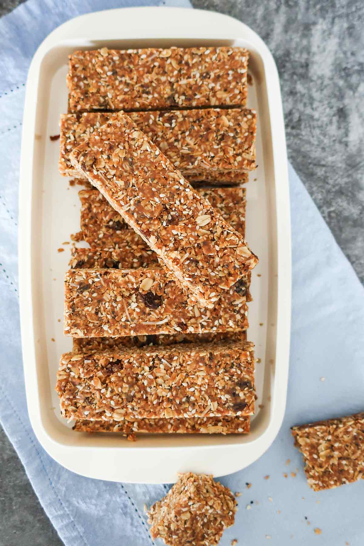 oat, nut and fruit bars in a closed glass container