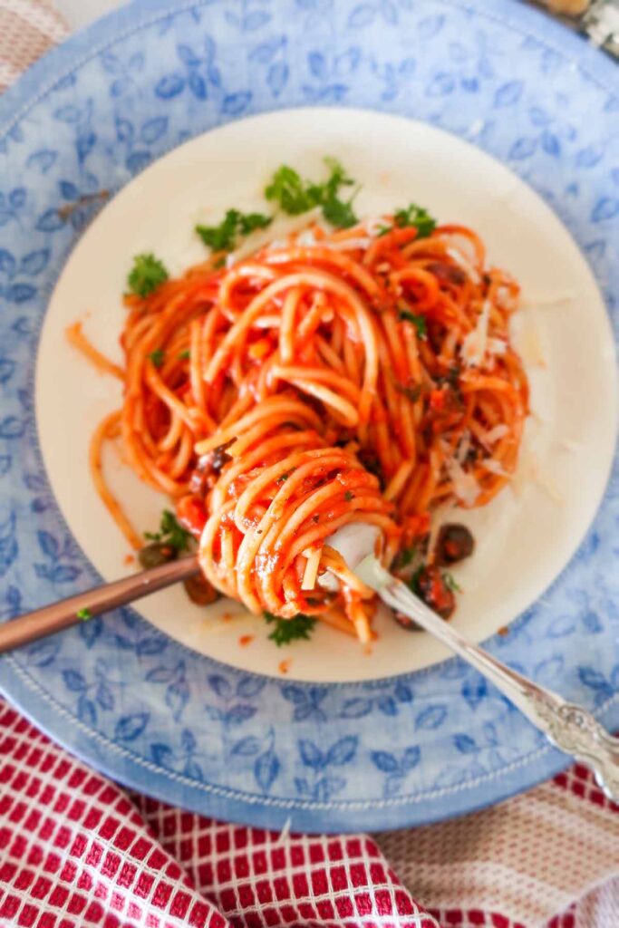 pasta with sauce swirled on a fork