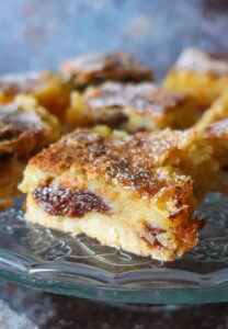 gluten free raisin lemon bars on a dessert platter