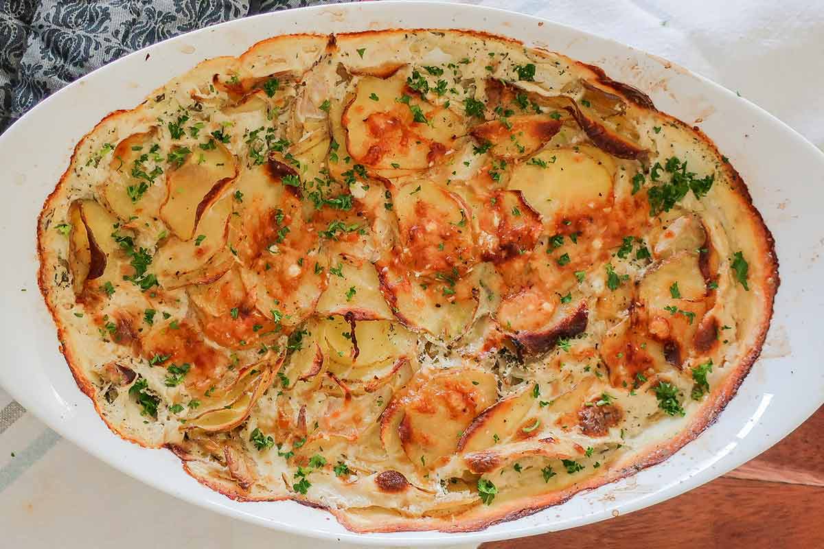 overview of baked scalloped potatoes in a casserole dish