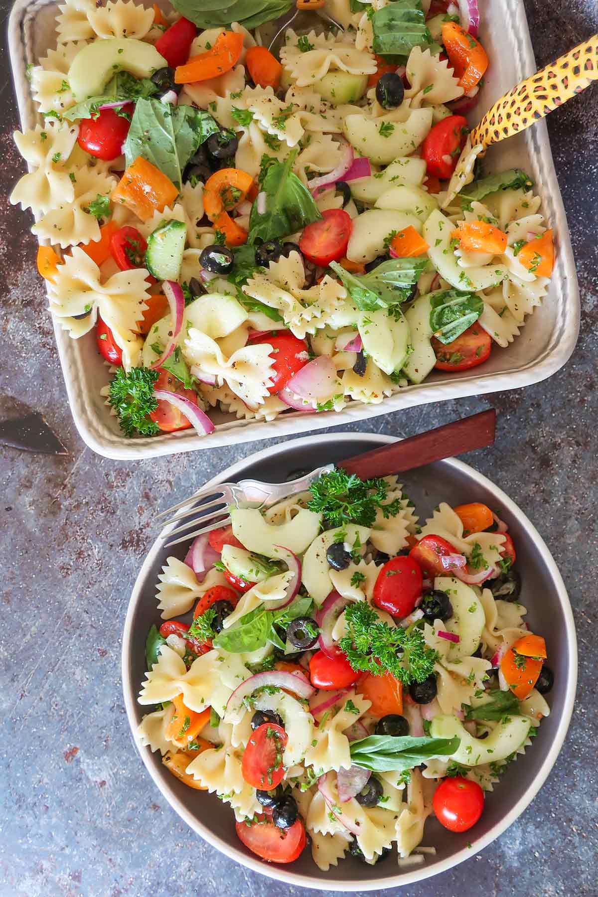serving bowl and side bowl of summer pasta salad