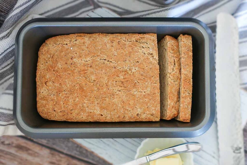 baked sliced food processor gluten free bread in a loaf pan