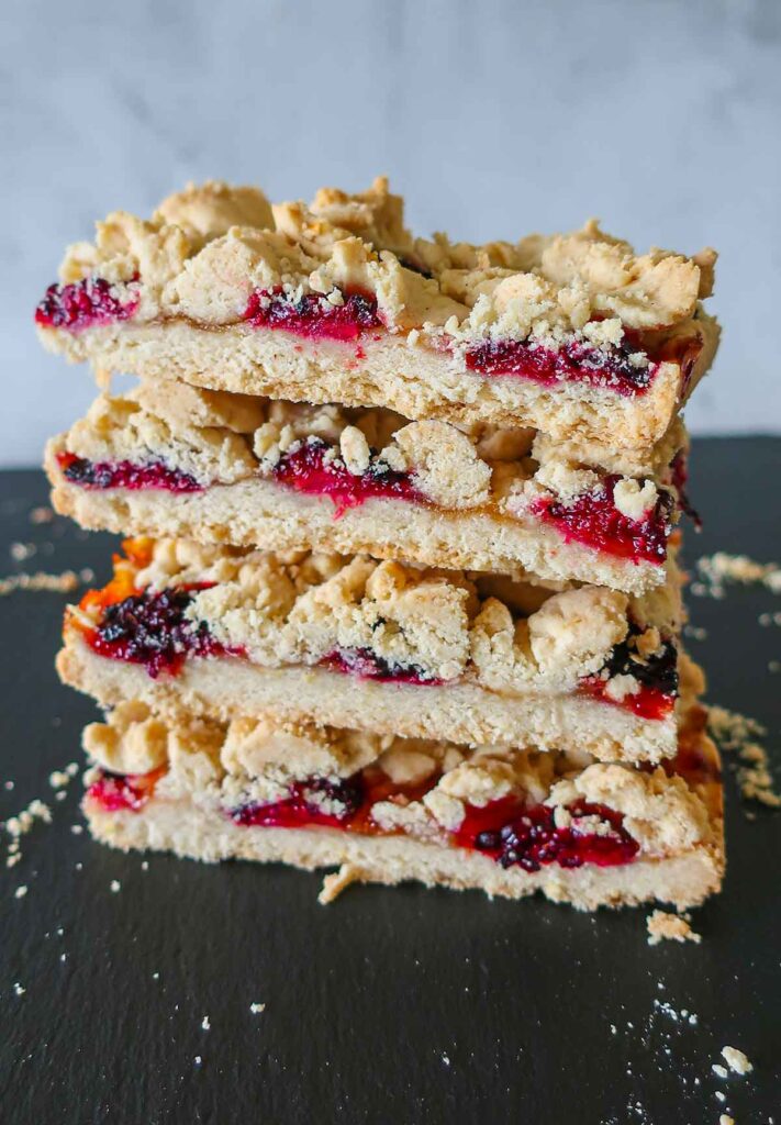 4 stacked gluten free blackberry crumble bars