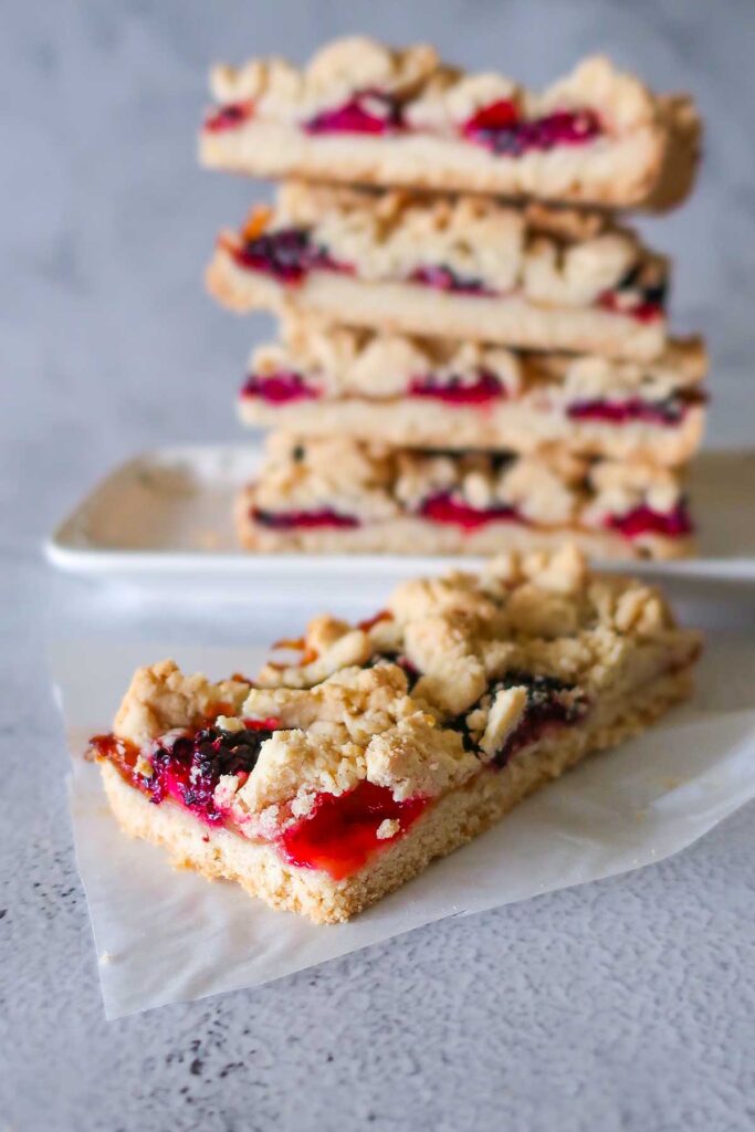 close up of a gluten free blackberry crumble bar