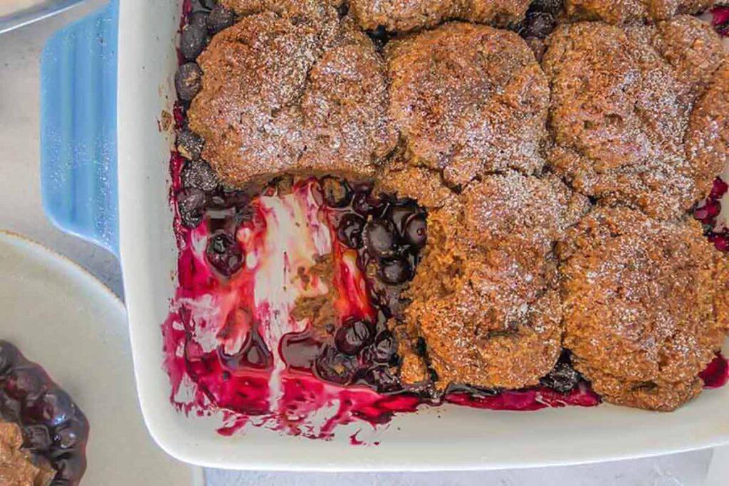 dairy free blueberry cobbler in a baking dish