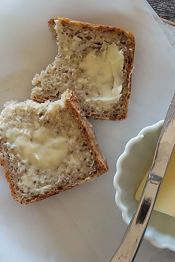 a slice of bread topped with butter
