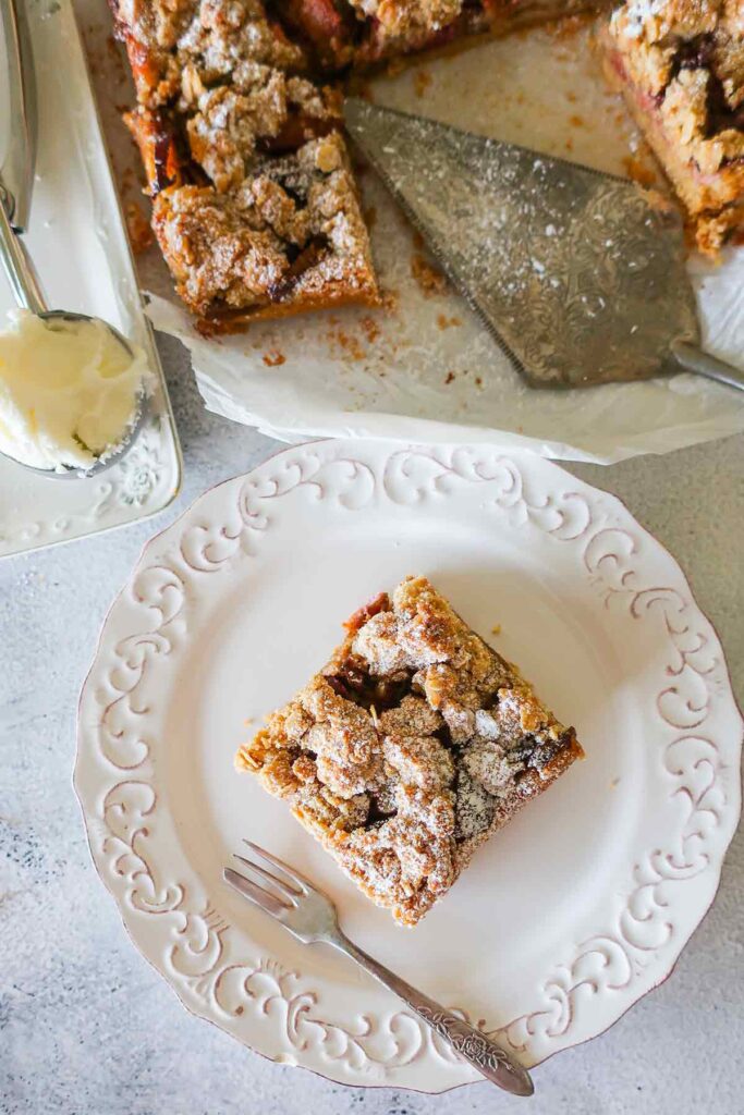 serving a slice of breakfast cake on a small plate