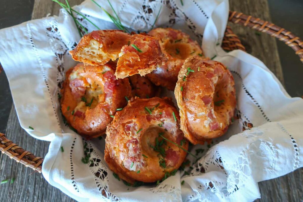 baked cheese and bacon donuts in a basket