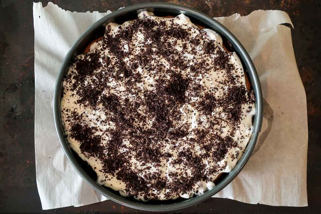 overview of baked oreo cookie cheesecake in a springform pan