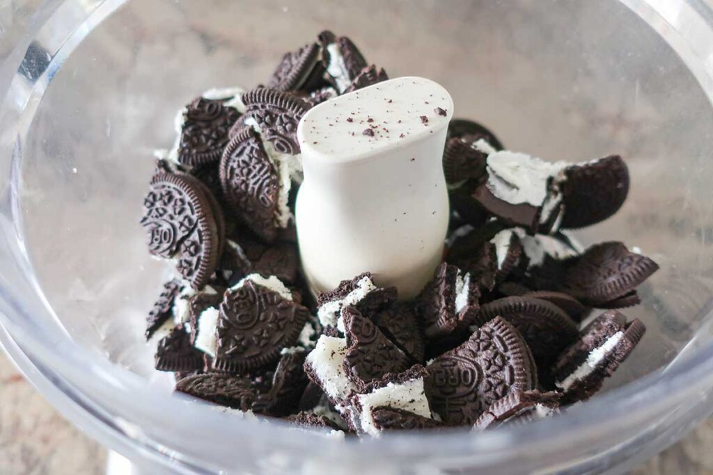 broken oreo cookies in a food processor