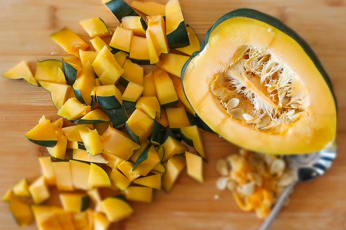 cubed and sliced raw acorn squash