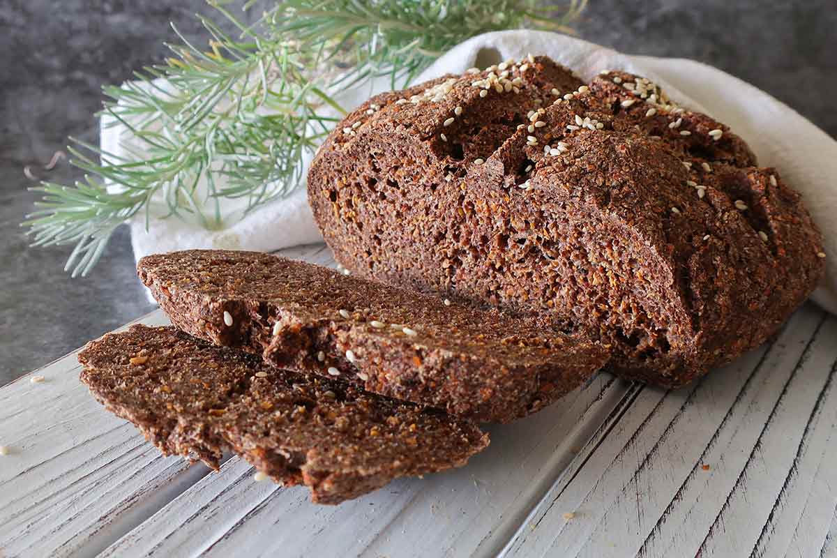 front view of sliced round flaxseed bread