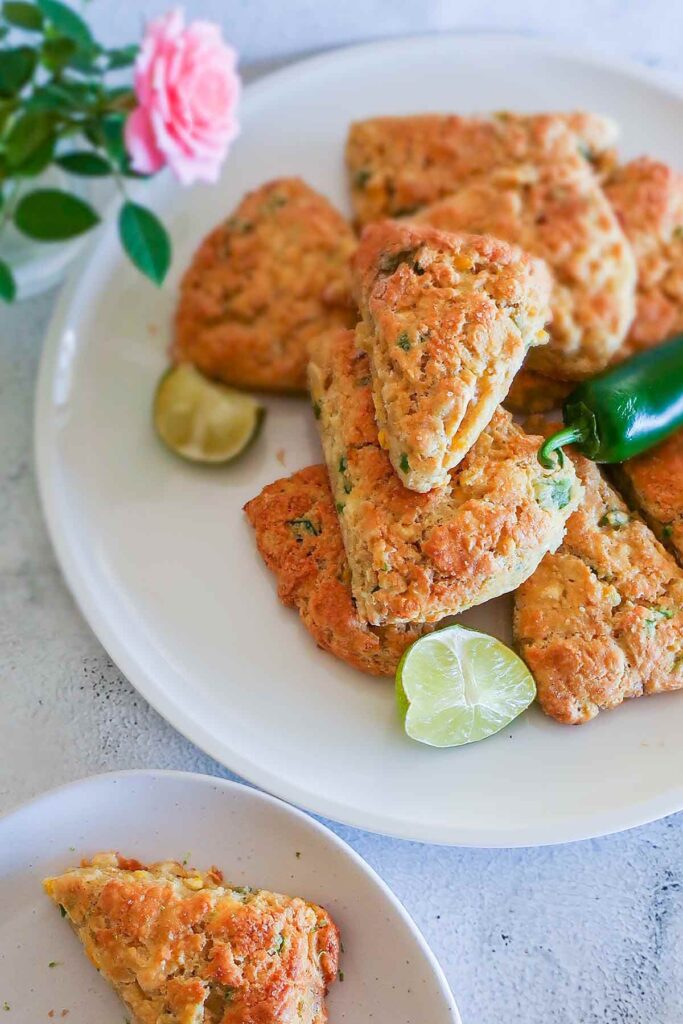 overview of scones on a plate with lime and jalapeno pepper