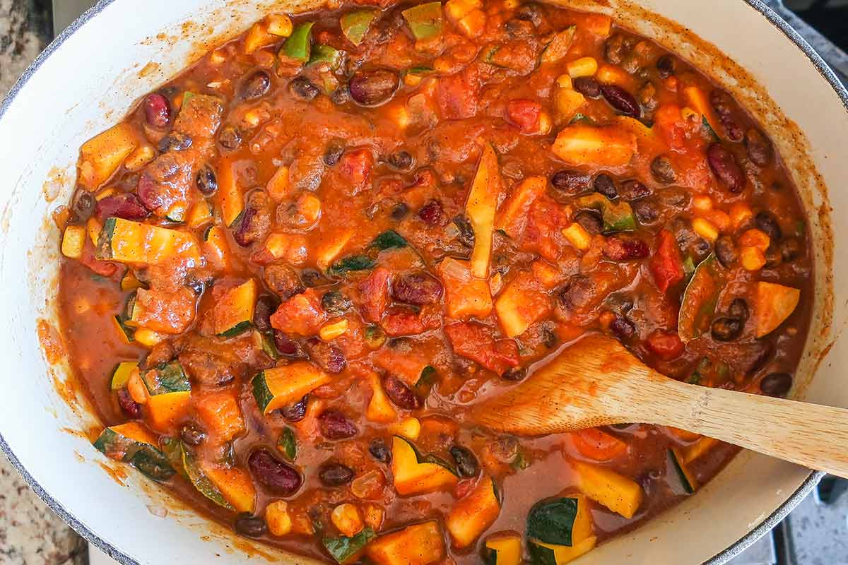 vegan pumpkin chili in a Dutch oven pot