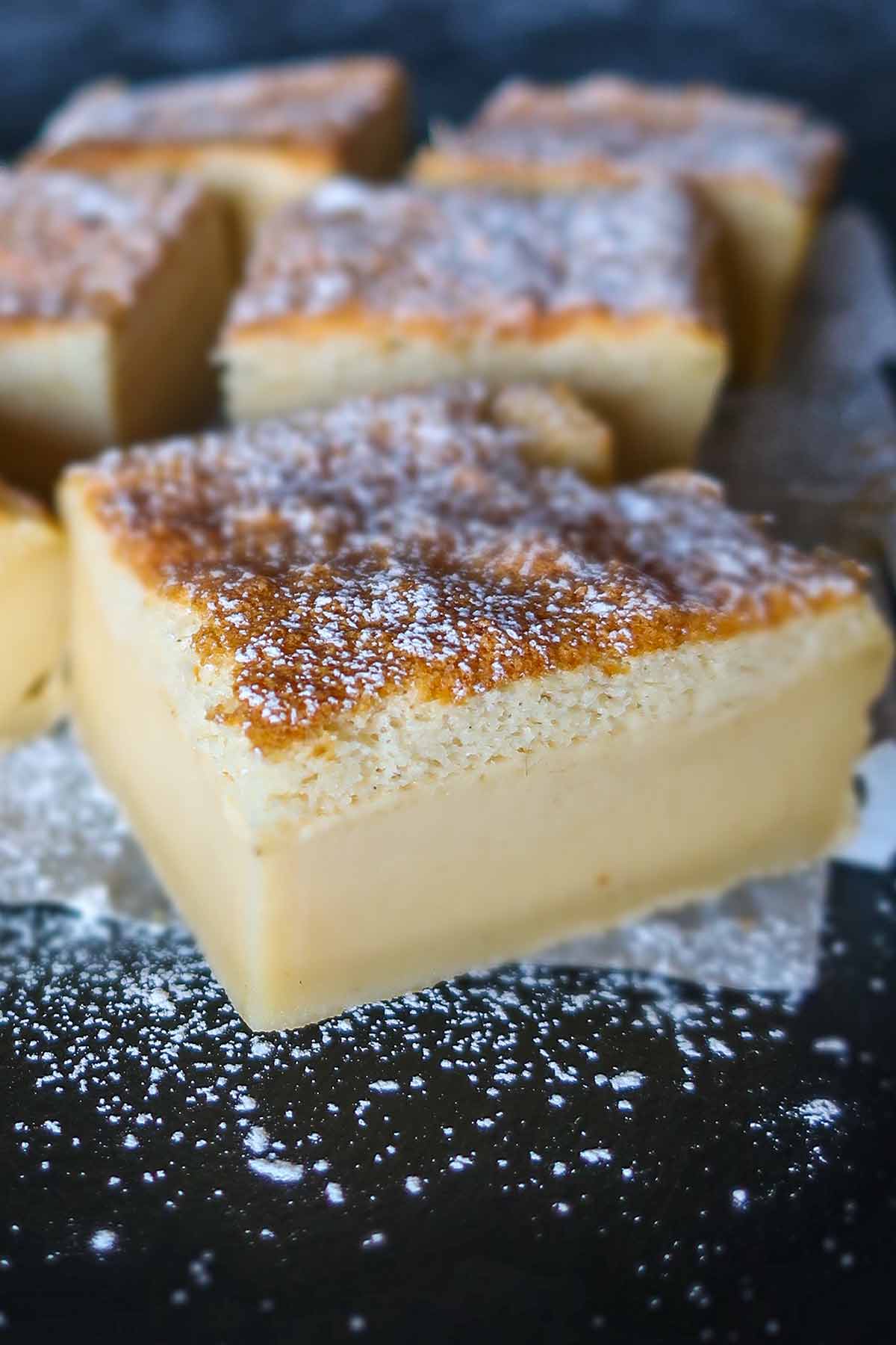 slice of vanilla magic custard cake