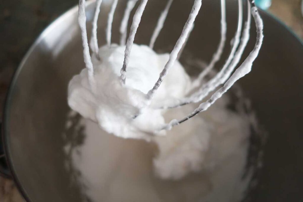 whipped egg whites on a whisk