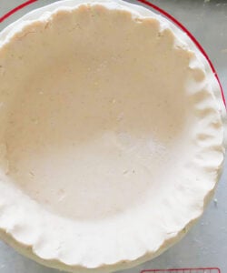 smooth unbaked food processor pie crust in a pie dish
