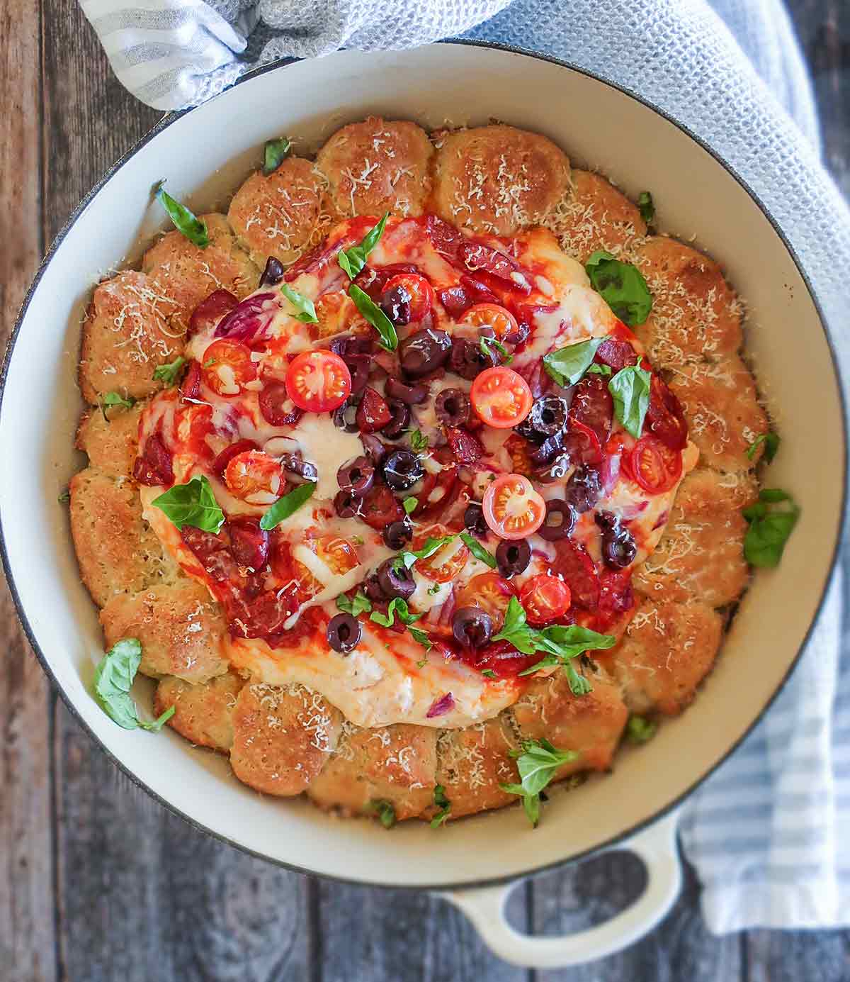 pizza dip with dipping bread made in a cast iron skillet