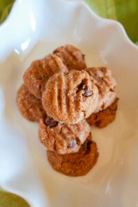 grain free almond butter chocolate chip cookies stacked on a plate