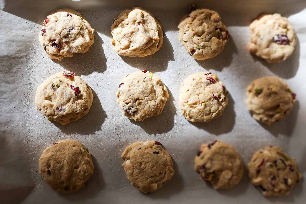 baked cookies cooling on a cookie sheet