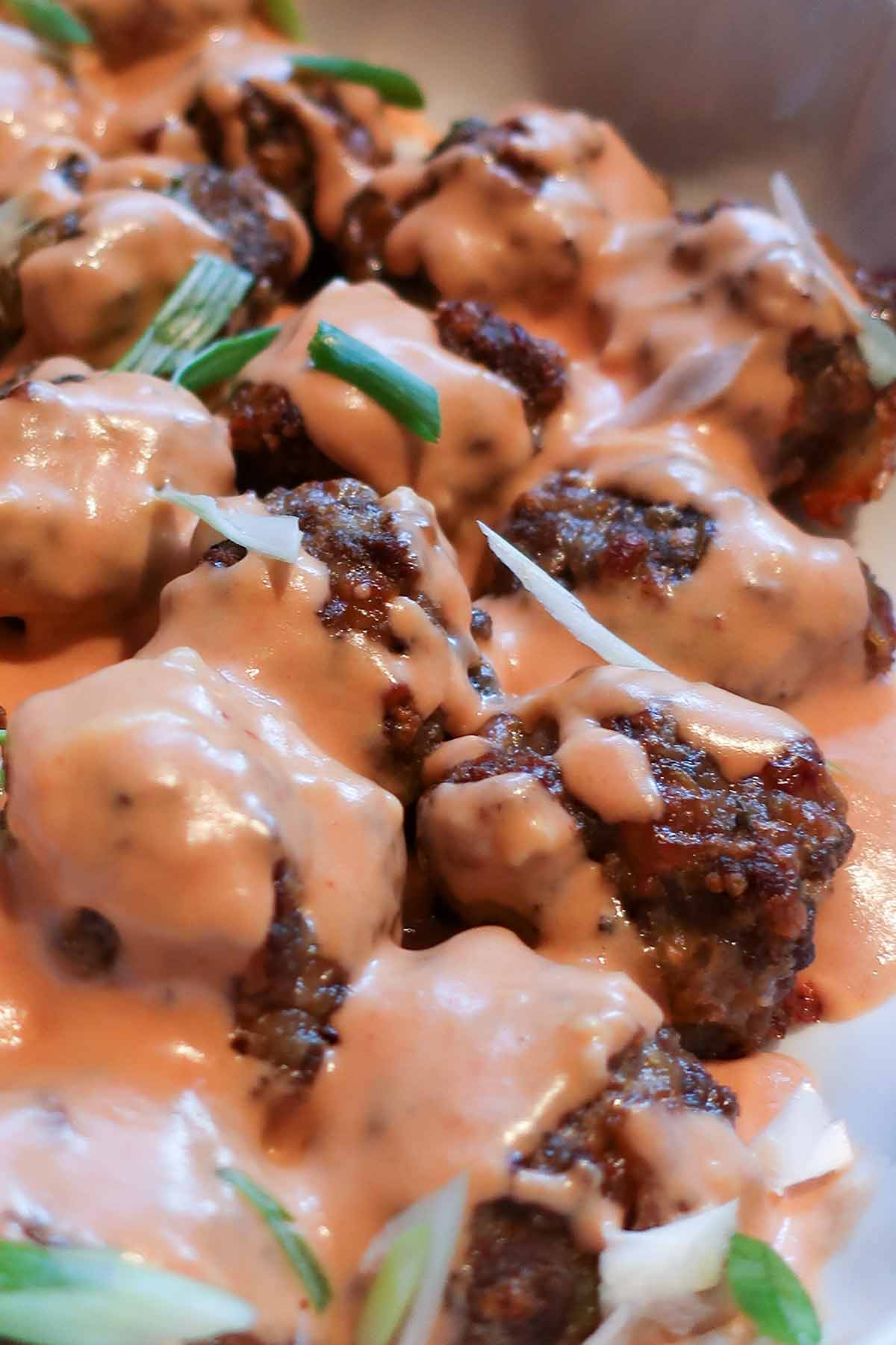 close up of Swedish meatballs with sauce