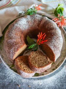 overview of gluten free earl grey bundt cake garnished with flowers