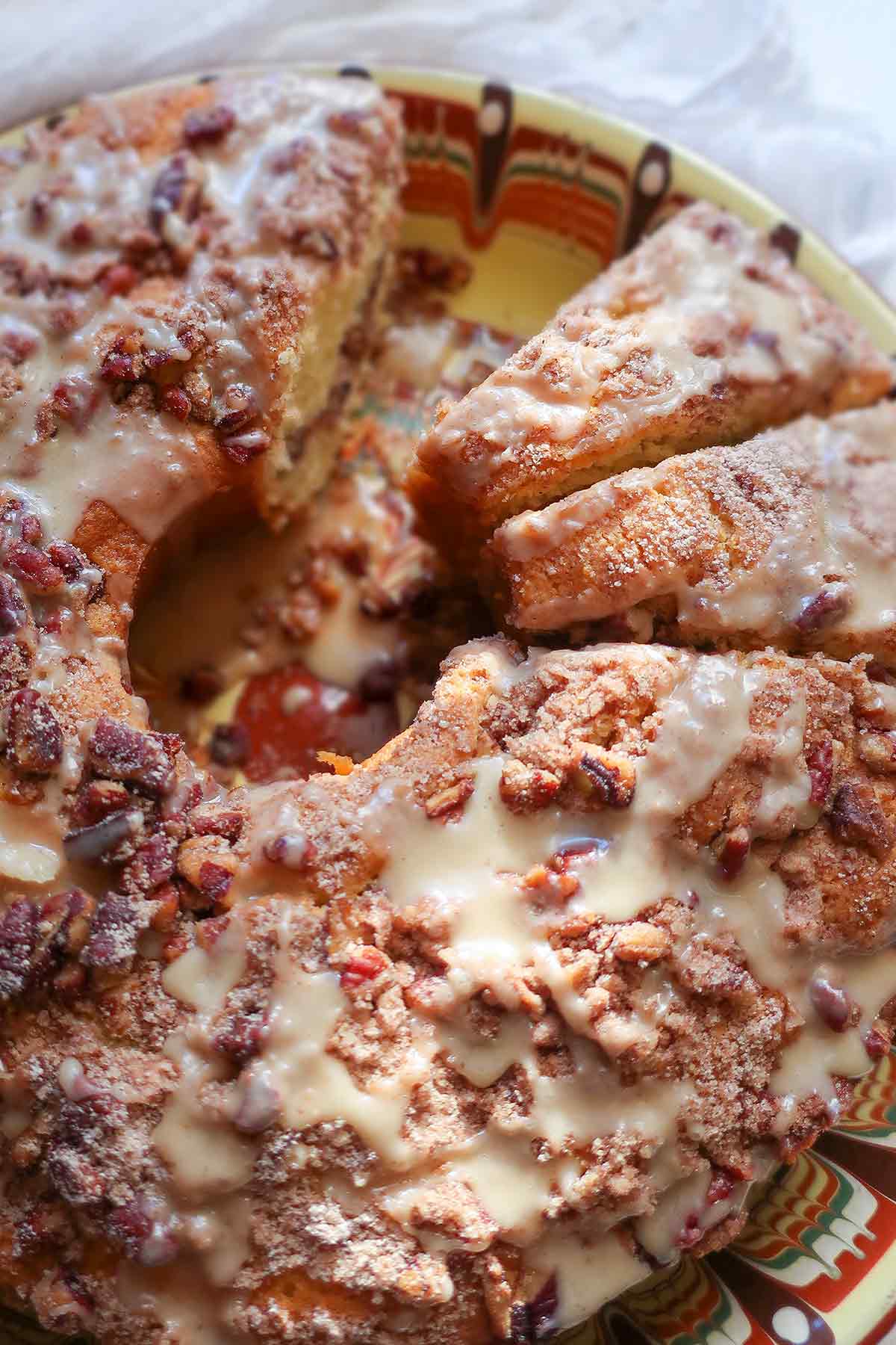 overview of sliced gluten free sour cream pecan coffee cake
