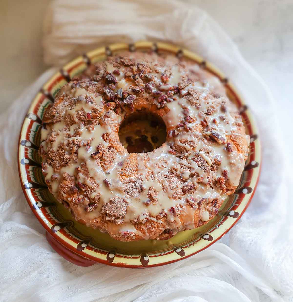 whole sour cream coffee cake on a platter