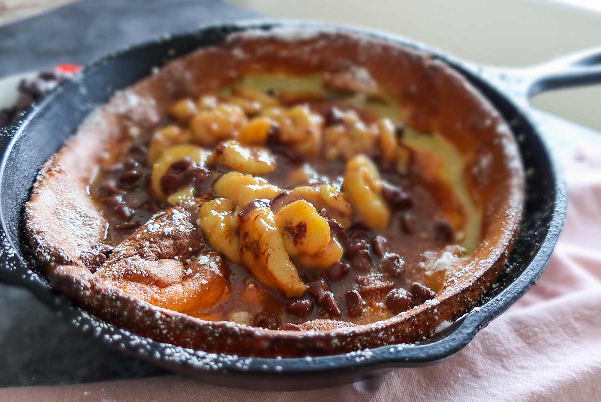 dutch baby filled with bananas and chocolate