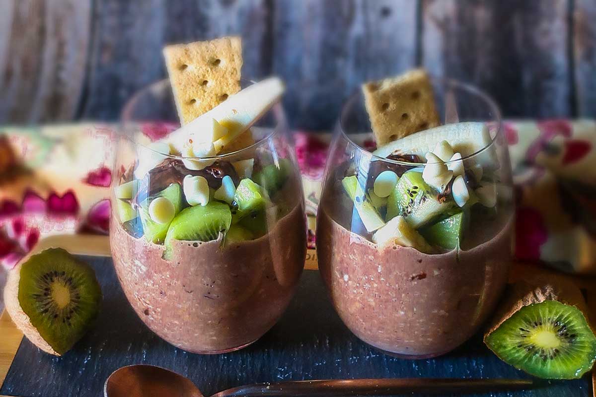 overnight oats topped with kiwi, bananas, graham crackers, chocolate chips